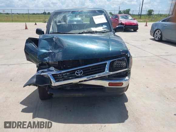 ✅ 1995 Toyota Tacoma • VIN: 4TAUN41BXSZ085210 • Lot: 42783818. Listed on IAAI with 199,999 mi. Free auction sales archive from the USA and detailed vehicle history report at DreamBid. Image 12.