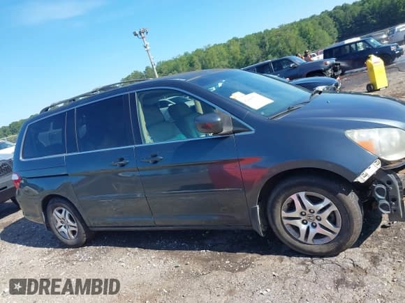 ✅ 2005 Honda Odyssey EX-L • VIN: 5FNRL38745B030919 • Лот: 42840538. Опубликован ранее на IAAI с пробегом 138 261 миль. Бесплатный доступ к архиву аукционных продаж из США и подробный отчёт об истории автомобиля на DreamBid. Изображение 14.