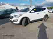 2015 Hyundai Santa Fe z VIN 5XYZU3LBXFG277476, wystawiony jako IAAI lot #43541323 z przebiegiem 100 864 mil mil oraz . Historia ofert i sprzedaży dostępna na DreamBid. Obrazek 17.