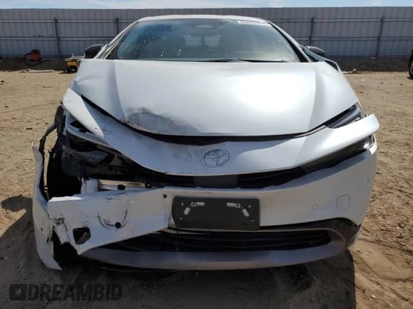 2024 Toyota Prius LE with VIN JTDACAAUXR3030010, listed as a Copart auction lot 69868615 with 22,790 mi miles and Salvage title. Bid and sale history available at DreamBid. Image 5.