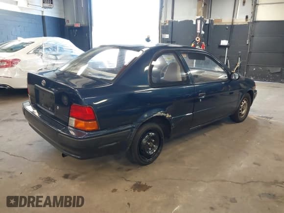 ✅ 1996 Toyota Tercel DX • VIN: JT2AC52L9T0139217 • Lot: 41898808. Wystawiony na IAAI z przebiegiem 86 500 mil. Bezpłatny archiwum sprzedaży aukcyjnych z USA i szczegółowy raport historii pojazdu na DreamBid. Zdjęcie 4.