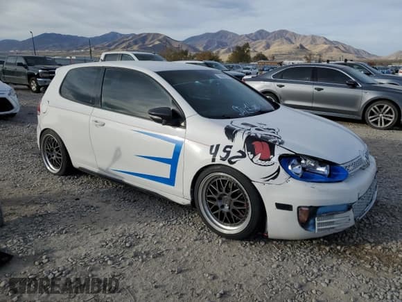 ✅ 2011 Volkswagen Golf GTI w/Sunroof • VIN: WVWEV7AJ2BW050955 • Lot: 90642225. Listed on Copart with 101,172 mi. Free auction sales archive from the USA and detailed vehicle history report at DreamBid. Image 4.