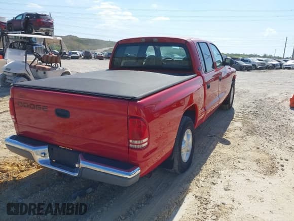 ✅ 2000 Dodge Dakota Sport • VIN: 1B7GL2AX0YS685498 • Lot: 42069753. Listed on IAAI with 56,269 mi. Free auction sales archive from the USA and detailed vehicle history report at DreamBid. Image 4.