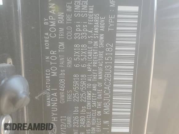 2011 Hyundai Tucson GLS z VIN KM8JUCAC2BU315182, wystawiony jako Copart lot #66692255 z przebiegiem 146 598 mil mil oraz Nie do naprawy • Non repairable. Historia ofert i sprzedaży dostępna na DreamBid. Obrazek 13.