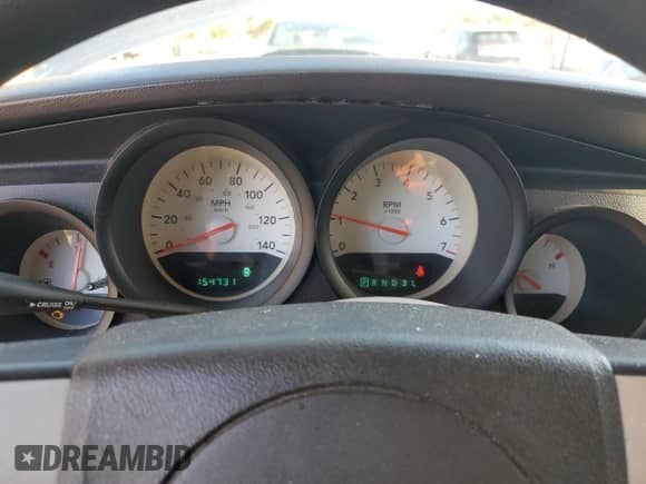 2007 Dodge Charger z VIN 2B3KA43RX7H621552, wystawiony jako Copart lot #86513765 z przebiegiem 154 731 mil mil oraz Szkoda całkowita • Salvage title. Historia ofert i sprzedaży dostępna na DreamBid. Obrazek 9.