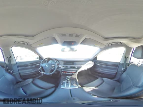 ✅ 2011 BMW 7 Series 750Li • VIN: WBAKB8C52BC851580 • Lot: 69135965. Listed on Copart with 140,890 mi. Free auction sales archive from the USA and detailed vehicle history report at DreamBid. Image 14.