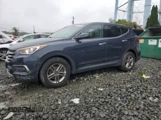 2018 Hyundai Santa Fe 2.4L with VIN 5NMZT3LB0JH081113, listed as a Copart auction lot 82356735 with 68,817 mi miles and Clean title. Bid and sale history available at DreamBid. Image 1.