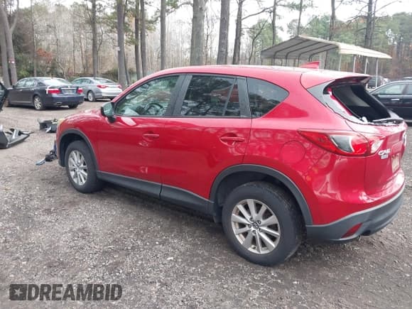 ✅ 2016 Mazda CX-5 Touring • VIN: JM3KE2CY3G0897193 • Lot: 43785978. Listed on IAAI with 119,937 mi. Free auction sales archive from the USA and detailed vehicle history report at DreamBid. Image 3.
