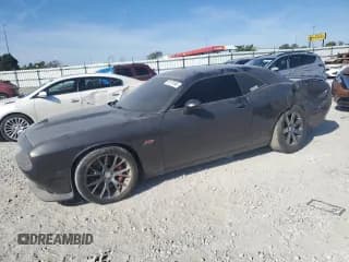 ✅ 2015 Dodge Challenger SRT 392 • VIN: 2C3CDZDJ7FH901559 • Lot: 70175195. Wystawiony na Copart z przebiegiem 106 929 mil. Bezpłatny archiwum sprzedaży aukcyjnych z USA i szczegółowy raport historii pojazdu na DreamBid. Zdjęcie 1.