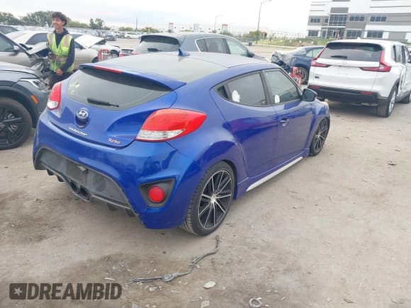 ✅ 2013 Hyundai Veloster Turbo • VIN: KMHTC6AE9DU181238 • Lot: 43525329. Listed on IAAI with 121,343 mi. Free auction sales archive from the USA and detailed vehicle history report at DreamBid. Image 4.