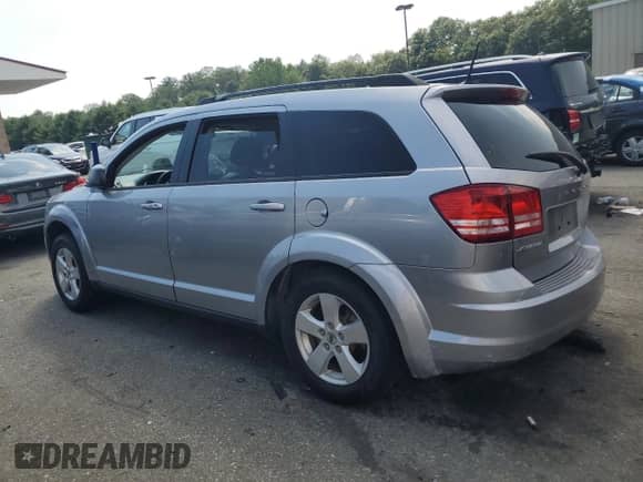 2018 Dodge Journey SE with VIN 3C4PDCABXJT495526, listed as a Copart auction lot 66272005 with 87,947 mi miles and Salvage title. Bid and sale history available at DreamBid. Image 2.