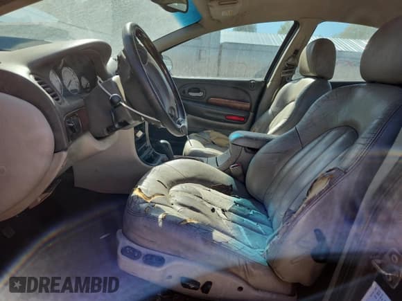 ✅ 2003 Chrysler Concorde Limited • VIN: 2C3HD56G13H550739 • Lot: 82534945. Listed on Copart with 272,677 mi. Free auction sales archive from the USA and detailed vehicle history report at DreamBid. Image 7.