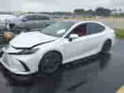 2025 Toyota Camry LE z VIN 4T1DAACK6SU606394, wystawiony jako IAAI lot #43223731 z przebiegiem 2 874 mil mil oraz . Historia ofert i sprzedaży dostępna na DreamBid. Obrazek 17.