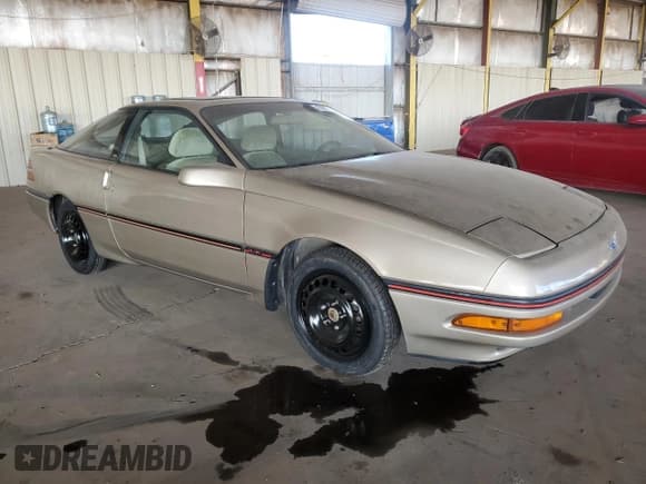 ✅ 1989 Ford Probe • VIN: 1ZVBT21C8K5178908 • Lot: 87082684. Listed on Copart with 84,344 mi. Free auction sales archive from the USA and detailed vehicle history report at DreamBid. Image 4.