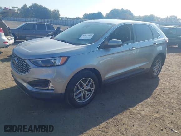 ✅ 2023 Ford Edge SEL • VIN: 2FMPK4J97PBA22448 • Лот: 43572809. Опубликован ранее на IAAI с пробегом 90 818 миль. Бесплатный доступ к архиву аукционных продаж из США и подробный отчёт об истории автомобиля на DreamBid. Изображение 2.