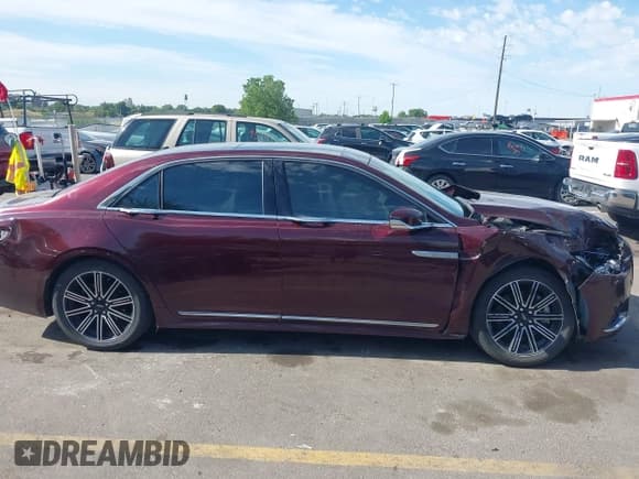 ✅ 2017 Lincoln Continental Reserve • VIN: 1LN6L9RP3H5603007 • Lot: 42373501. Listed on IAAI with 73,029 mi. Free auction sales archive from the USA and detailed vehicle history report at DreamBid. Image 13.