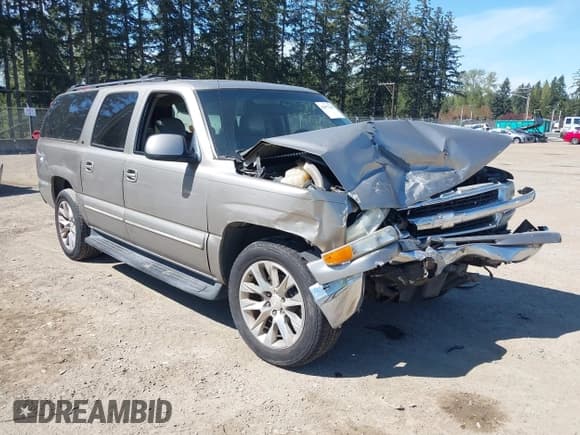 ✅ 2003 Chevrolet Suburban LT • VIN: 3GNEC16Z23G155942 • Lot: 42077249. Listed on IAAI with 218,465 mi. Free auction sales archive from the USA and detailed vehicle history report at DreamBid. Image 1.