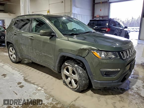 ✅ 2018 Jeep Compass Latitude • VIN: 3C4NJDBBXJT156477 • Lot: 94721855. Listed on Copart with 73,844 mi. Free auction sales archive from the USA and detailed vehicle history report at DreamBid. Image 4.