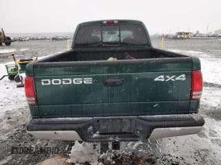 ✅ 2002 Dodge Dakota SLT • VIN: 1B7HG48N12S614309 • Lot: 87309554. Wystawiony na Copart z przebiegiem 287 994 mil. Bezpłatny archiwum sprzedaży aukcyjnych z USA i szczegółowy raport historii pojazdu na DreamBid. Zdjęcie 6.