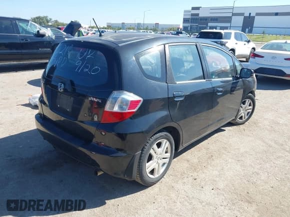 ✅ 2010 Honda Fit • VIN: JHMGE8H22AS010764 • Lot: 43480345. Listed on IAAI with 104,384 mi. Free auction sales archive from the USA and detailed vehicle history report at DreamBid. Image 4.