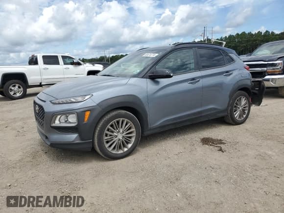✅ 2018 Hyundai Kona SEL • VIN: KM8K22AA7JU142597 • Лот: 60474774. Опубликован ранее на Copart с пробегом 69 136 миль. Бесплатный доступ к архиву аукционных продаж из США и подробный отчёт об истории автомобиля на DreamBid. Изображение 1.