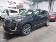 ✅ 2023 Cadillac XT5 AWD Premium Luxury • VIN: 1GYKNDRS2PZ122350 • Lot: 42123718. Listed on IAAI with 17,971 mi. Free auction sales archive from the USA and detailed vehicle history report at DreamBid. Image 2.