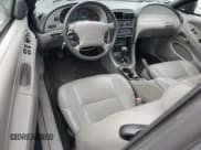 ✅ 1999 Ford Mustang GT • VIN: 1FAFP42X0XF176423 • Lot: 87211215. Listed on Copart with 37,928 mi. Free auction sales archive from the USA and detailed vehicle history report at DreamBid. Image 8.