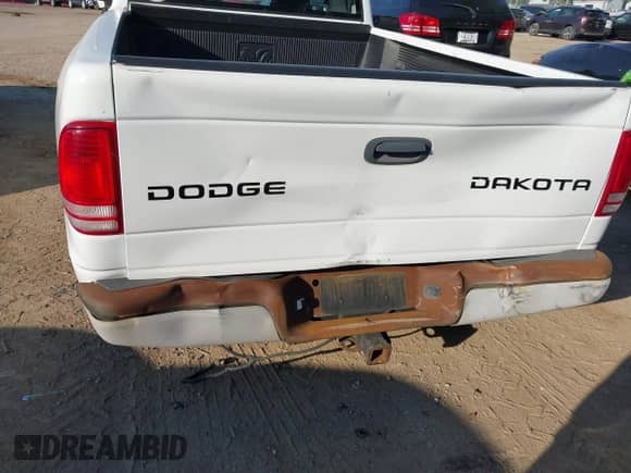 2004 Dodge Dakota Sport z VIN 1D7GL32K84S615322, wystawiony jako IAAI lot #42655462 z przebiegiem 187 209 mil mil oraz . Historia ofert i sprzedaży dostępna na DreamBid. Obrazek 6.