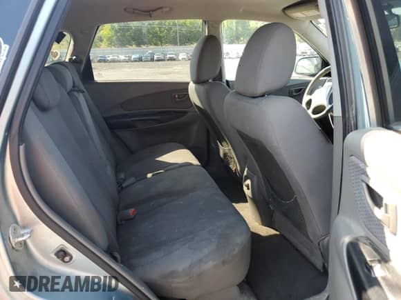 2009 Hyundai Tucson GLS z VIN KM8JM12B29U953176, wystawiony jako Copart lot #70141174 z przebiegiem 77 132 mil mil oraz Szkoda całkowita • Salvage title. Historia ofert i sprzedaży dostępna na DreamBid. Obrazek 11.