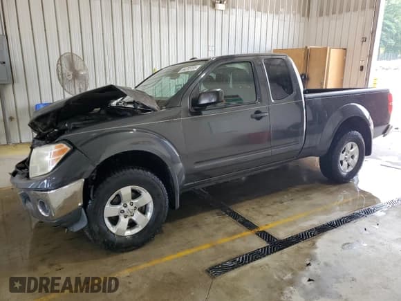 ✅ 2011 Nissan Frontier SV • VIN: 1N6AD0CW6BC407599 • Lot: 66285185. Listed on Copart with 111,271 mi. Free auction sales archive from the USA and detailed vehicle history report at DreamBid. Image 1.
