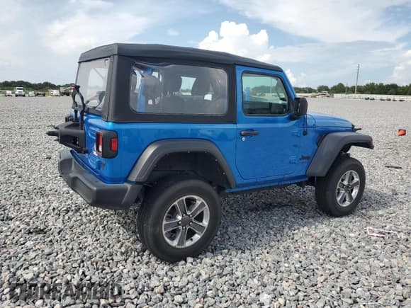 ✅ 2023 Jeep Wrangler Sport S • VIN: 1C4GJXAN4PW636667 • Lot: 64936505. Listed on Copart with 33,192 mi. Free auction sales archive from the USA and detailed vehicle history report at DreamBid. Image 3.