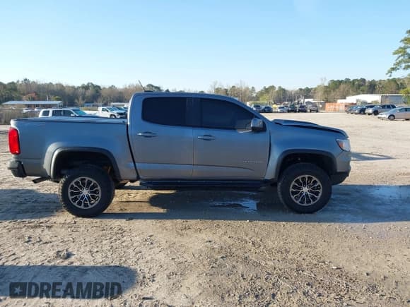 ✅ 2022 Chevrolet Colorado 4WD ZR2 • VIN: 1GCGTEEN0N1305930 • Лот: 41823662. Опубликован ранее на IAAI с пробегом 25 431 миль. Бесплатный доступ к архиву аукционных продаж из США и подробный отчёт об истории автомобиля на DreamBid. Изображение 14.