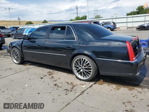 ✅ 2006 Cadillac DTS 1SE • VIN: 1G6KD57996U242434 • Lot: 65639195. Listed on Copart with 201,424 mi. Free auction sales archive from the USA and detailed vehicle history report at DreamBid. Image 2.