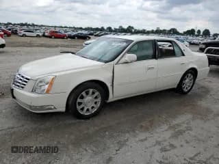 ✅ 2009 Cadillac DTS 1SC • VIN: 1G6KD57Y09U134165 • Lot: 58767545. Listed on Copart with 34,938 mi. Free auction sales archive from the USA and detailed vehicle history report at DreamBid. Image 1.