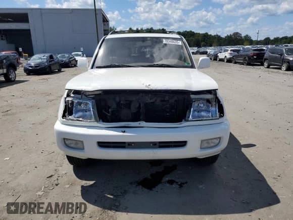 ✅ 2002 Toyota Land Cruiser • VIN: JTEHT05J022028895 • Lot: 70348635. Listed on Copart with 154,453 mi. Free auction sales archive from the USA and detailed vehicle history report at DreamBid. Image 5.