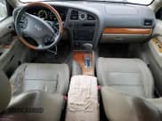 ✅ 2002 Infiniti QX4 Luxury • VIN: JNRDR09Y42W257288 • Лот: 84765564. Опубликован ранее на Copart с пробегом 250 388 миль. Бесплатный доступ к архиву аукционных продаж из США и подробный отчёт об истории автомобиля на DreamBid. Изображение 8.