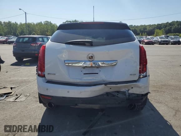 ✅ 2016 Cadillac SRX Premium Collection • VIN: 3GYFNDE3XGS517423 • Lot: 70914805. Listed on Copart with 164,008 mi. Free auction sales archive from the USA and detailed vehicle history report at DreamBid. Image 6.