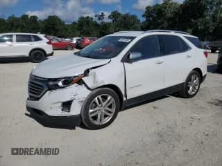 ✅ 2020 Chevrolet Equinox Premier • VIN: 3GNAXPEX1LS713153 • Лот: 66997985. Опубликован ранее на Copart с пробегом 123 643 миль. Бесплатный доступ к архиву аукционных продаж из США и подробный отчёт об истории автомобиля на DreamBid. Изображение 1.