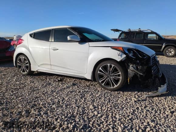 2016 Hyundai Veloster Turbo with VIN KMHTC6AE7GU284808, listed as a Copart auction lot 79896544 with 154,609 mi miles and Salvage title. Bid and sale history available at DreamBid. Image 4.