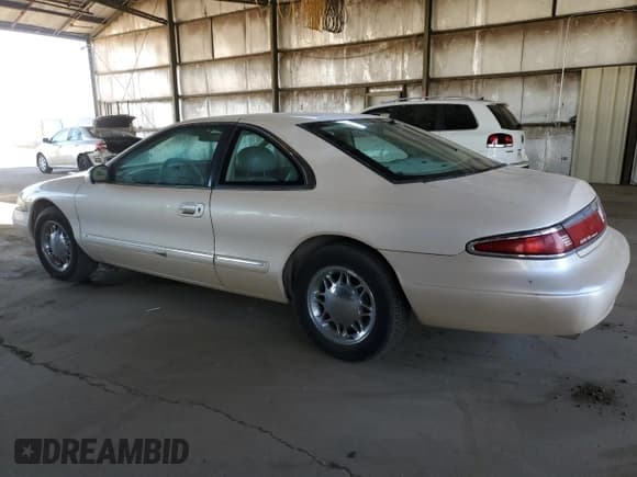✅ 1997 Lincoln Mark VIII • VIN: 1LNLM91V3VY602590 • Lot: 44431555. Listed on Copart with 157,445 mi. Free auction sales archive from the USA and detailed vehicle history report at DreamBid. Image 2.