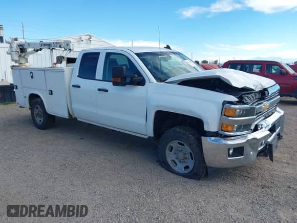 2016 Chevrolet Silverado 2500HD Work Truck z VIN 1GC2KUEG4GZ261086, wystawiony jako IAAI lot #43264492 z przebiegiem 290 510 mil mil oraz . Historia ofert i sprzedaży dostępna na DreamBid. Obrazek 1.