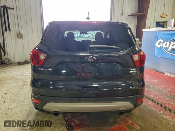 ✅ 2019 Ford Escape SE • VIN: 1FMCU9GD9KUA77164 • Лот: 93738335. Опубликован ранее на Copart с пробегом 70 524 миль. Бесплатный доступ к архиву аукционных продаж из США и подробный отчёт об истории автомобиля на DreamBid. Изображение 6.