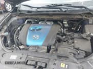 ✅ 2013 Mazda CX-5 Touring • VIN: JM3KE2CE1D0132257 • Lot: 42700625. Listed on IAAI with 87,796 mi. Free auction sales archive from the USA and detailed vehicle history report at DreamBid. Image 10.