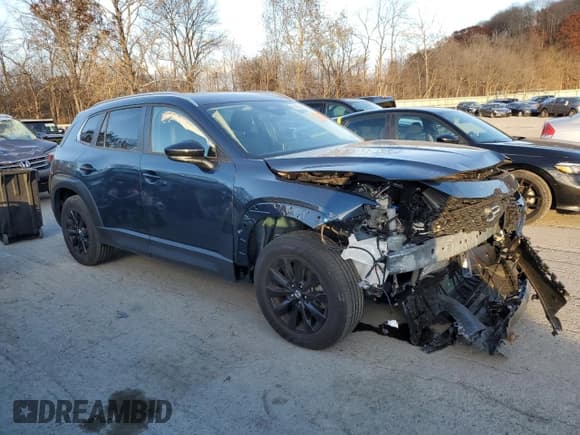 ✅ 2025 Mazda CX-50 S Premium • VIN: 7MMVABDM6SN350671 • Lot: 92092215. Listed on Copart with 3,960 mi. Free auction sales archive from the USA and detailed vehicle history report at DreamBid. Image 4.