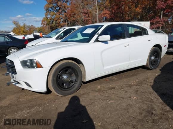 2014 Dodge Charger Police with VIN 2C3CDXAT3EH357912, listed as a IAAI auction lot 43579059 with 144,016 mi miles and . Bid and sale history available at DreamBid. Image 18.