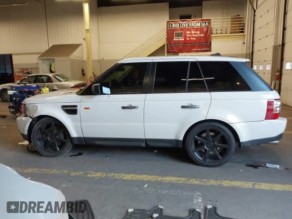 ✅ 2007 Land Rover Range Rover Sport SC • VIN: SALSH23417A990424 • Lot: 43647063. Listed on IAAI with 220,795 mi. Free auction sales archive from the USA and detailed vehicle history report at DreamBid. Image 14.