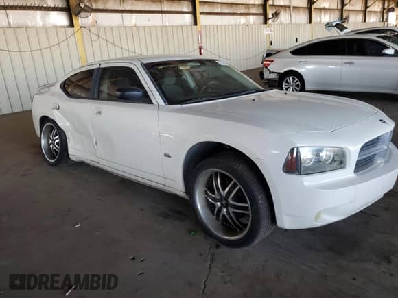 2009 Dodge Charger SXT z VIN 2B3KA33V39H573080, wystawiony jako Copart lot #77794044 z przebiegiem 117 601 mil mil oraz Szkoda całkowita • Salvage title. Historia ofert i sprzedaży dostępna na DreamBid. Obrazek 4.