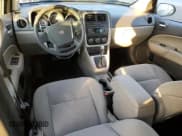 ✅ 2010 Dodge Caliber Mainstreet • VIN: 1B3CB3HAXAD648284 • Лот: 84856604. Опубликован ранее на Copart с пробегом 84 032 миль. Бесплатный доступ к архиву аукционных продаж из США и подробный отчёт об истории автомобиля на DreamBid. Изображение 8.