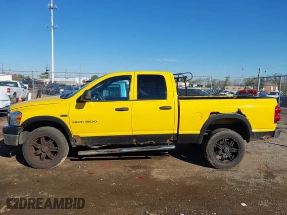✅ 2007 Dodge 1500 SLT • VIN: 1D7HU18207S247025 • Lot: 43571706. Listed on IAAI with 235,688 mi. Free auction sales archive from the USA and detailed vehicle history report at DreamBid. Image 14.