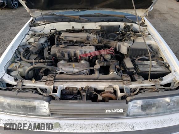 ✅ 1992 Mazda 626 • VIN: 1YVGD22B7N5214355 • Лот: 86899014. Опубликован ранее на Copart с пробегом 89 811 миль. Бесплатный доступ к архиву аукционных продаж из США и подробный отчёт об истории автомобиля на DreamBid. Изображение 11.